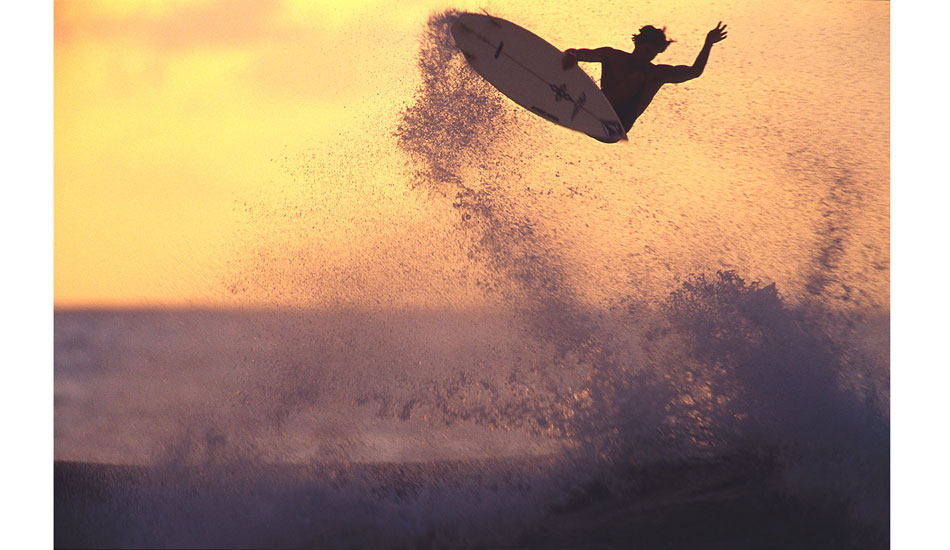 Bruce Irons backlit ariel at Backdoor Pipeline 2001