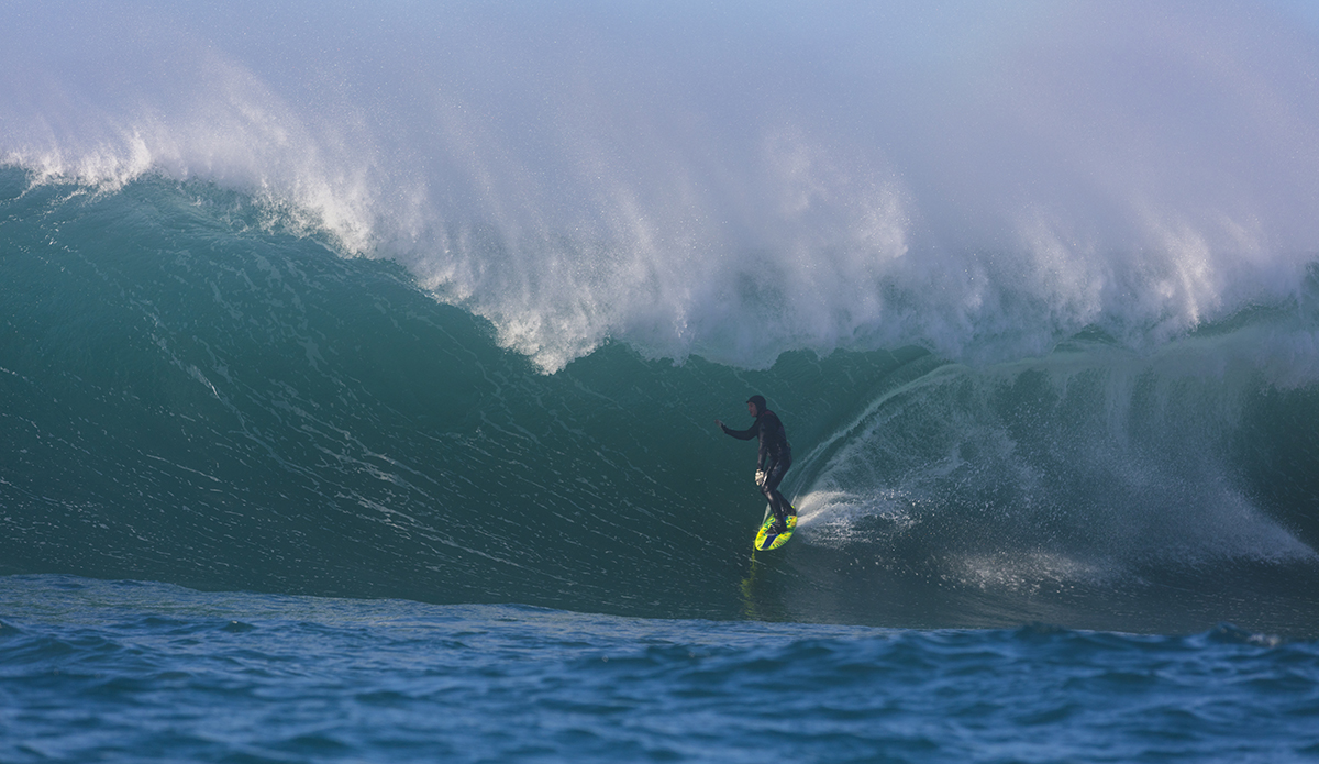 Oscar Smith rides a barrel at a remote reefbreak near Dunedin, New Zealand.