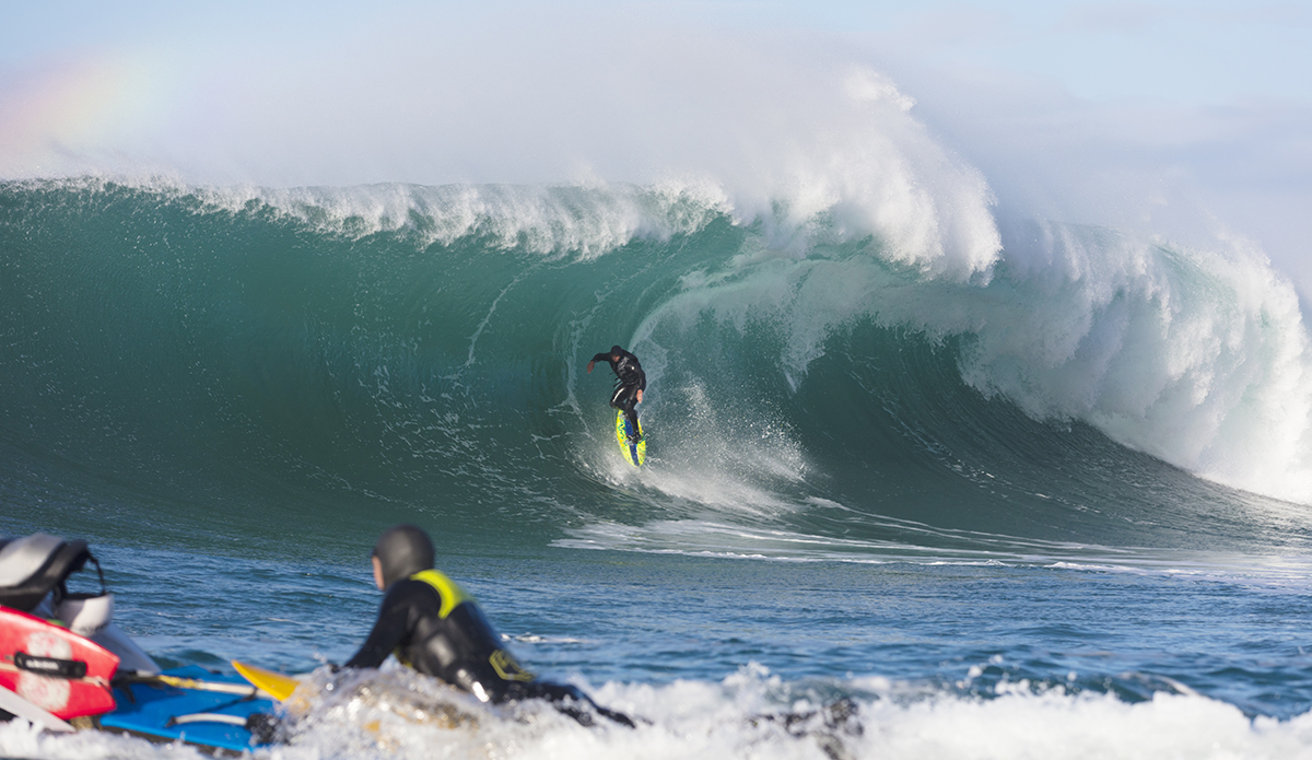 Nat Parsons rides a big wave at a remote reefbreak near Dunedin, New Zealand.