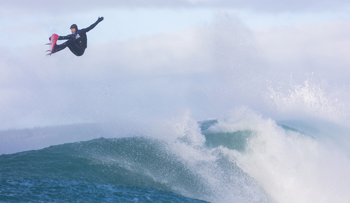 Dale Hunter revels in large surf conditions at a remote reefbreak near Dunedin, New Zealand.