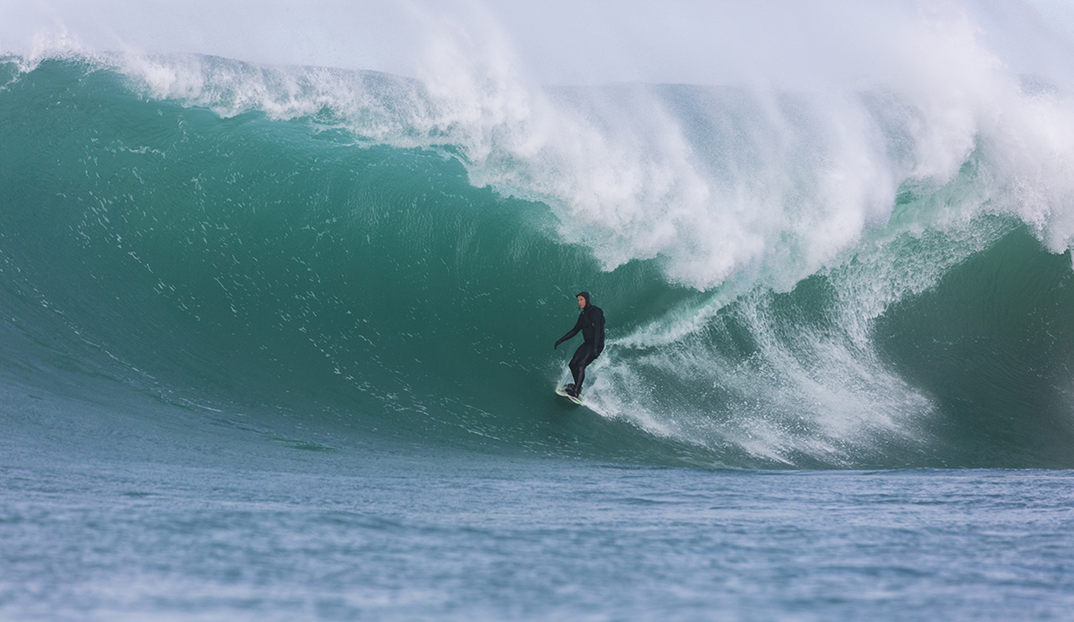 Jimi Crooks rides a barrel at a remote reefbreak near Dunedin, New Zealand.