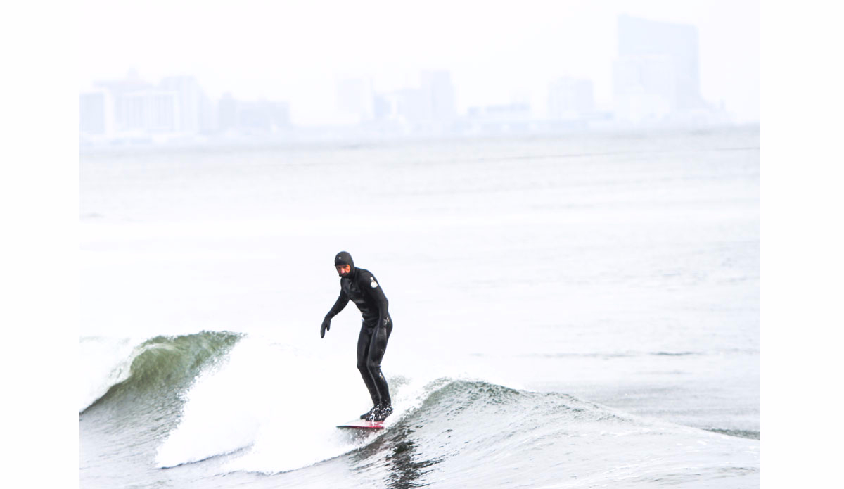 longboarder-w-atlantic-city-skyline