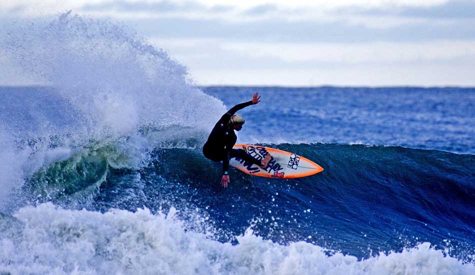 5Tommy_Ihnken's_surfing_can_be_described_as-_Going_as_fast_as_you_can_andthrow_as_much_spray_as_you_can_and_punt_big_airs!