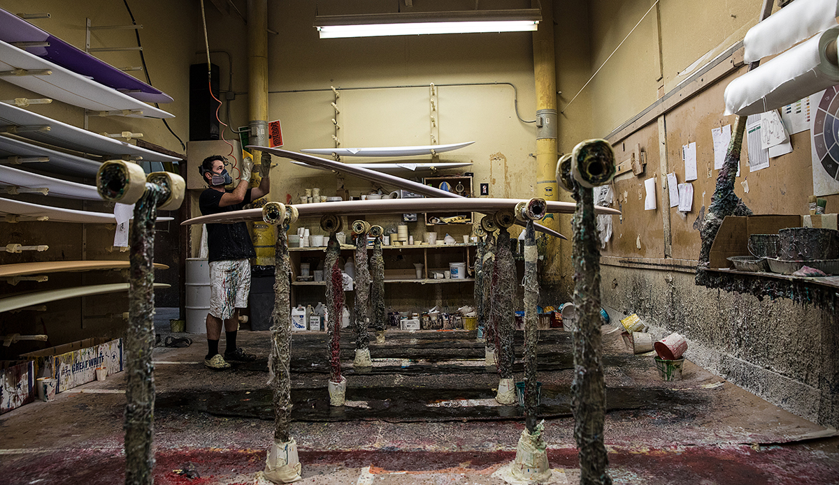 Ryan Martz hard at work in the lam room at The Watermans Guild. Santa Ana, CA.