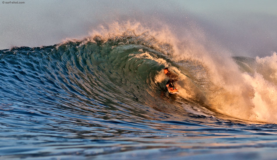 Alex Gray, December 2009. Alex Gray in the hot light of sunrise. Photo: Surf-Shot.com