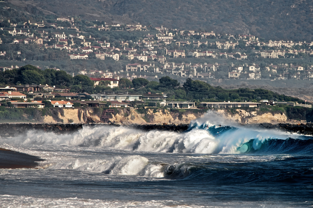 From this vantage it seems as though all of Newport Beach is focused on Wedge, and that suits Bobby Okvist just fine as he dropps this massive peak during the Hurricane Marie swell.