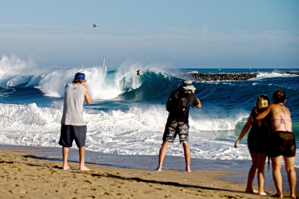 Common sights at Wedge these days: crowds, soft tops, and free falls from the lip.