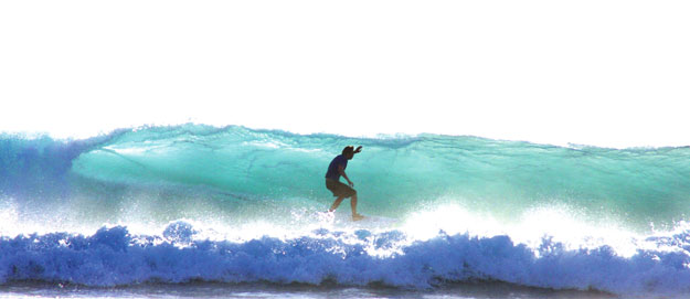 "For all of the eye-opening experiences associated with the sport of surfing, there still seems to be very little mention or acknowledgment of surfing’s gay community," says GaySurfers.Net Founder, Thomas C. (pictured in West Timor). Thomas, the Founder of GaySurfers.net, finds perfection in West Timor.