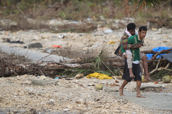 Survivors in the village of Muntei, on Pagai Selatan. Photo: SurfAid