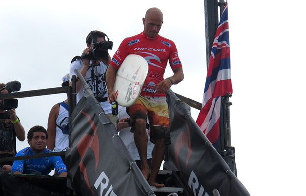 Adriano De Souza had come within an interference call of sending the King to the repercharge, and in the post-heat interview, he was none too happy about it. “He was just being ridiculous in the water," Slater said. "It was kind of silly." Photo: Matt Bauer Kelly Slater prepares to surf against Adriano De Souza at the Rip Curl Pro Search Somewhere in Puerto Rico