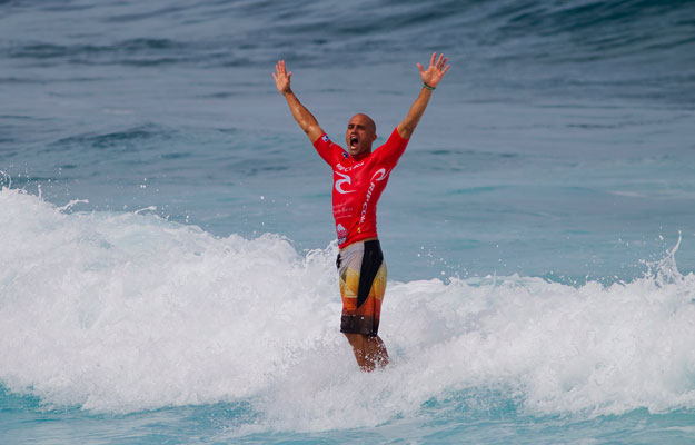 Officially a ten-time World Champion. Kelly Slater's victory lap. Photo: ASP Officially a ten-time World Champion. Kelly Slater's victory lap. Photo: ASP