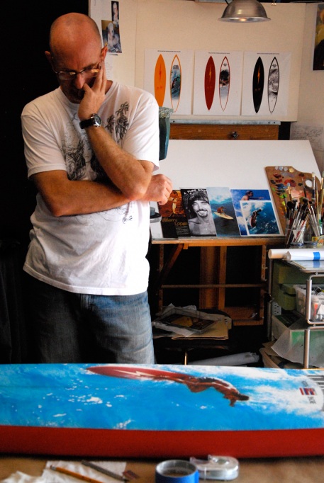 Portrait of the artist: Phil Roberts as he works on the Pipeline Masters commemorative board. Portrait of the artist: Phil Roberts as he works on the Pipeline Masters commemorative board.