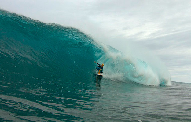 While this may have been good for surfers in Russia and in Alaska (Sarah Palin was saying, "I can see triple-overhead sets from my house!") this was not producing the sizeable winter surf the North Shore is accustomed to. Photo: Anthony Walsh Keala Kennelly Backdoor Pipeline Barrel