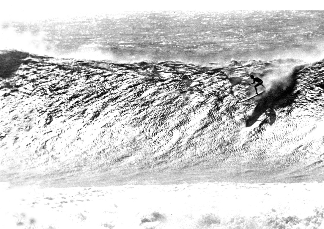 Greg Noll's legendary big wave at Makaha as captured by Alby Falzon