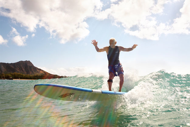 “One incident that really upset me is that there was a surf shop in Florida that used to put big swastikas on their boards,” said Dorian "Doc" Paskowitz, “and I got hold of them and I really raised hell with them, and they called the Klu Klux Klan guys in, and that really scared the shit out of me.” Photo: Art Brewer Dorian Doc Paskowitz surfs