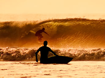 Surfer barreled in Spain