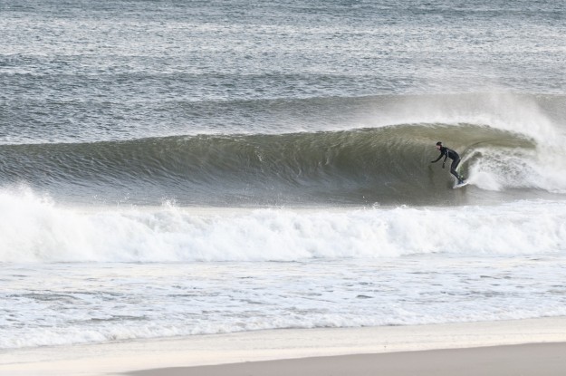 When I saw the ocean, I couldn't believe my eyes. A set formed upon the horizon and peeled along the sandbar. I felt like a kid again. Photo: Joanne O'Shaughnessy Perfect Wave Bayhead New Jersey Winter