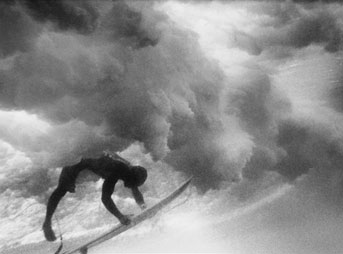 I try to produce some kind of visual poetry, in an ongoing documentary project. I look for essence, long term. Surfing is ethereal.