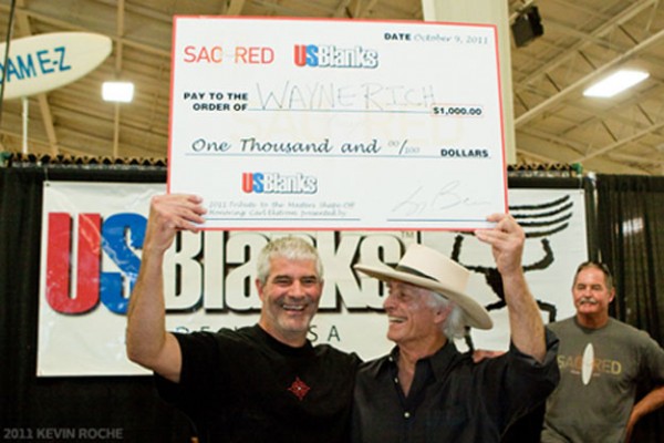 Wayne Rich looking happy with an over-sized cheque. Photo: Roche Wayne Rich looking happy with an over-sized cheque. Photo: Roche