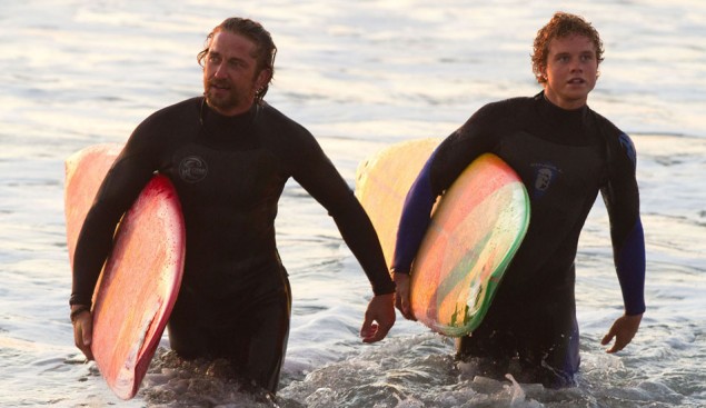 Gerard Butler and Jonny Weston making their way out of the water during a scene in Chasing Mavericks. Photo: 20th Century Fox Gerard Butler and Jonny Weston making their way out of the water during a scene in Chasing Mavericks. Photo: 20th Century Fox