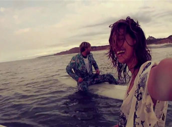 Kassia Meador and Mikey Detemple longboard Montauk and say goodbye to summer.