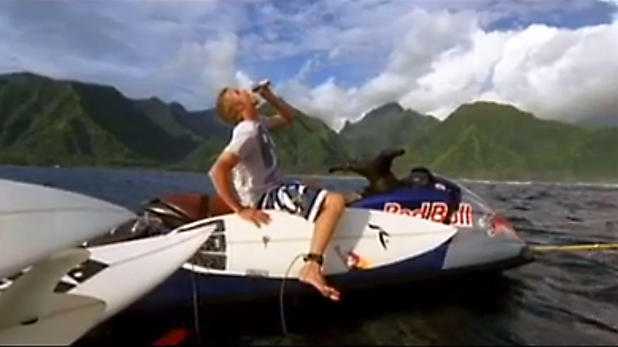 Jamie O'Brien gulps a quick pick me up or Red Bull mid-session. Photo: Who Is Job?
