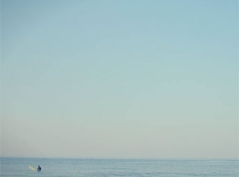 Longboarder beach horizon