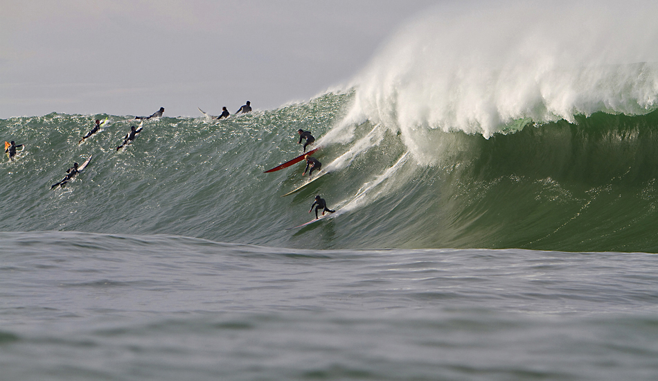 Party wave at Mavericks 2010. Todd Tissue, Ryan Augenstein and Tyler Fox