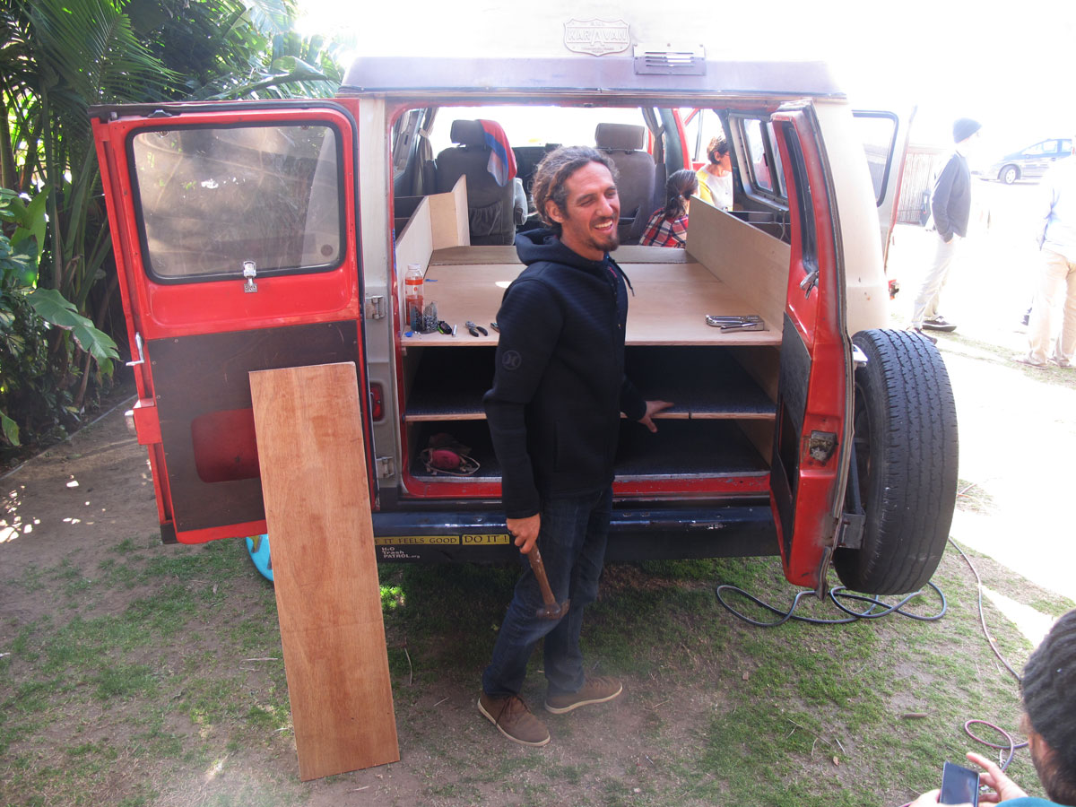 Rob Machado working on his ultimate surf van. Rob Machado working on his ultimate surf van.