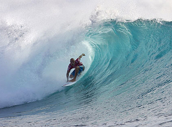 Kelly Slater drives through a real tube. Nothing artificial about this one. Photo: ASP/Kirstin