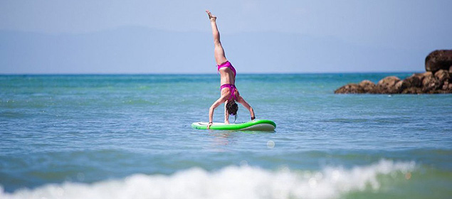 Gillian Gibree posing on her SUP.