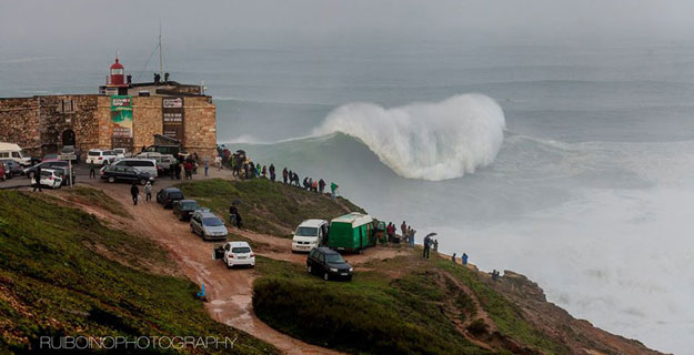 This morning's XXL swell in Portugal set off big wave alarms around the world. A crew of hellmen/women converged on Nazaré, potentially setting world records, breaking bones, and thrilling the world. Photo: Rui Boino