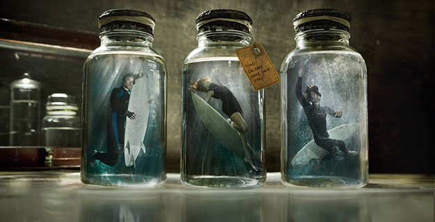 This is the final instalment of Protect Our Waves campaign images. It depicts surfers preserved in specimen jars and explores the theme of extinction, highlighting the environmental issues that currently threaten UK waves. Photo: Scott Rhea