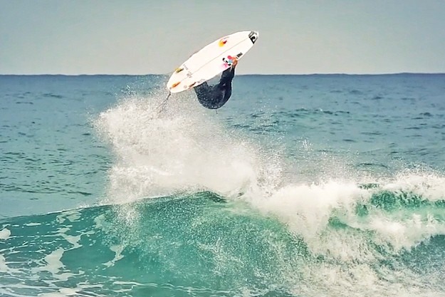 Jordy Smith flipping in Now Now. Photo: Grind TV