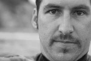 A portrait of the artist, John Lucarelli.