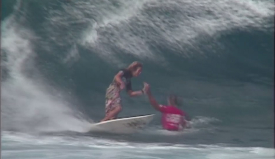 Not even Pipe Masters stood between these two legendary surfers sharing the stoke. Photo: Quiksilver