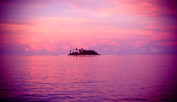 Purple sunset in the Mentawais, shot on velvia film. Sometimes you can put things in the center of the frame. Image: Roche