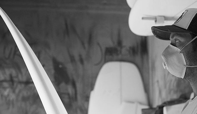 Dan O'Hara, eyeing his craft. Photo: Mary-Ellen Kennedy/Solid Surfboards