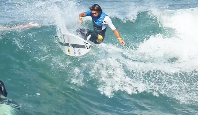Dodging the mass onslaught of adolescent teenagers and making the best of the remaining waves for the week long contest at the US Open, Imai DeVault logged a power hour session on the north side pier.
