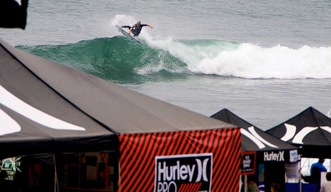 Kolohe Andino takes to the air at the 2013 Hurley Pro. Photo: Benjamin Ginsberg