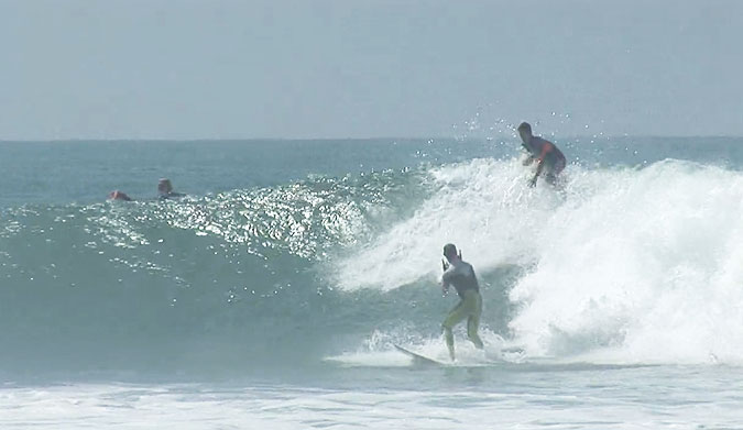 There's an upside to getting dropped in on by the number one ranked surfer in the world.