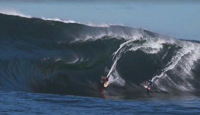 Mark Mathews and Taj Burrow tackle the right together.