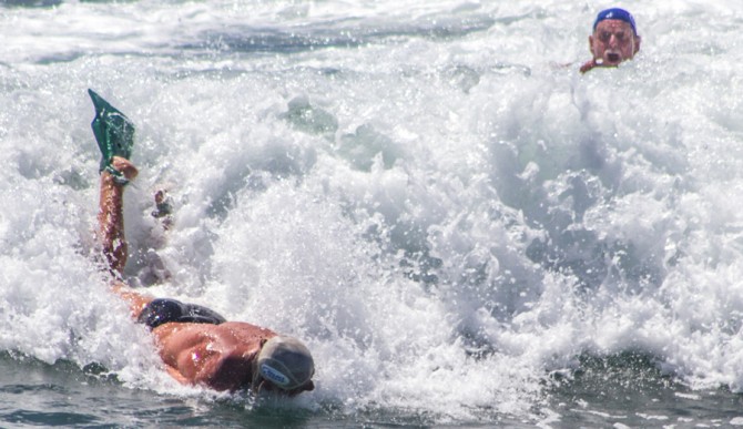 Mark Cunningham taking Prone Form to the beach at the end of his heat at WBC 14. Photo: Courtesy of Swell Lines Magazine
