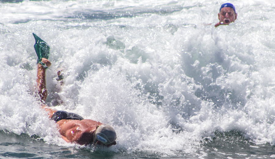 Mark Cunningham taking Prone Form to the beach at the end of his heat at WBC 14. Photo: Courtesy of Swell Lines Magazine