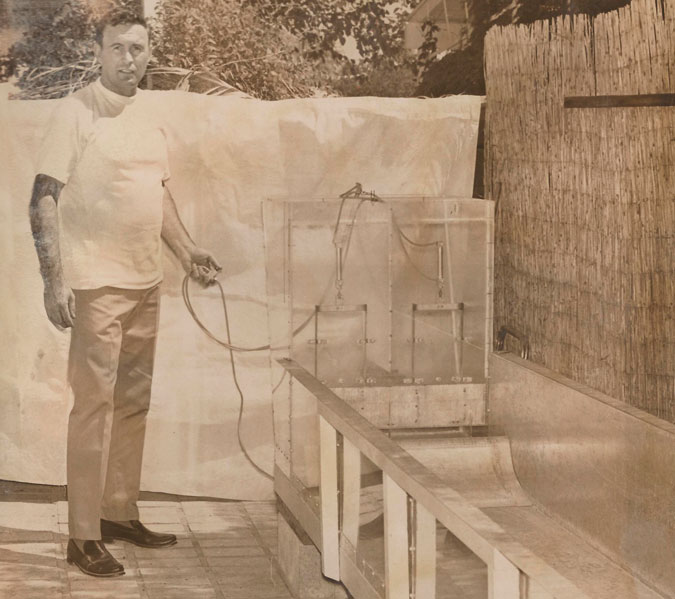 Phil Dexter at home with his second backyard wave pool model.