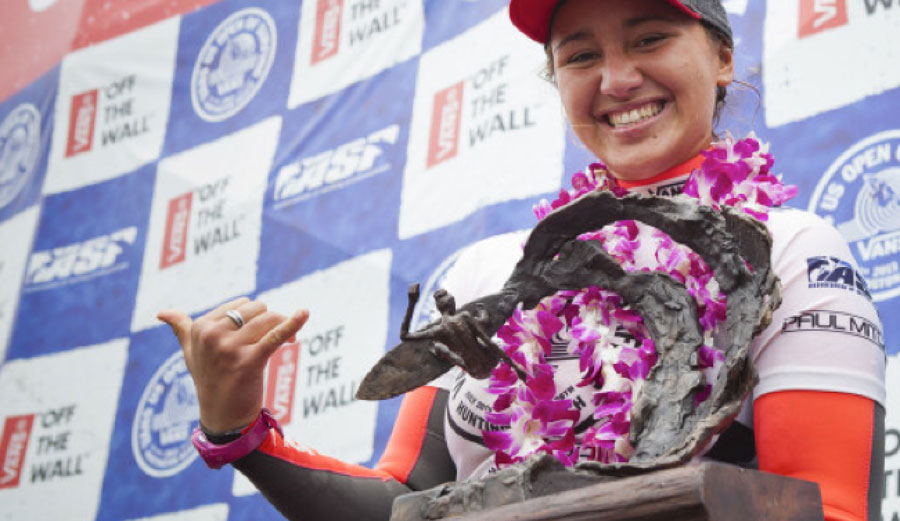 Carissa Moore collects her prize at the U.S Open of Surfing.