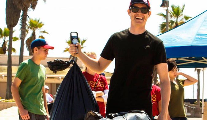 Andrew Sneddon weighing in at the end of a long day of cleaning up the beach.