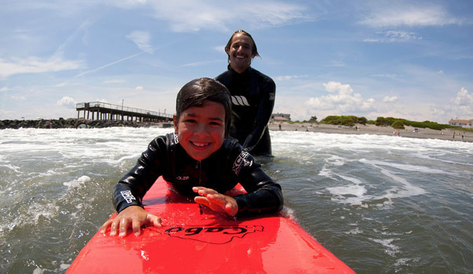 Teaching someone to surf can be just as rewarding as surfing.