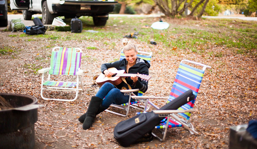 Lakey Peterson playing guitar.
