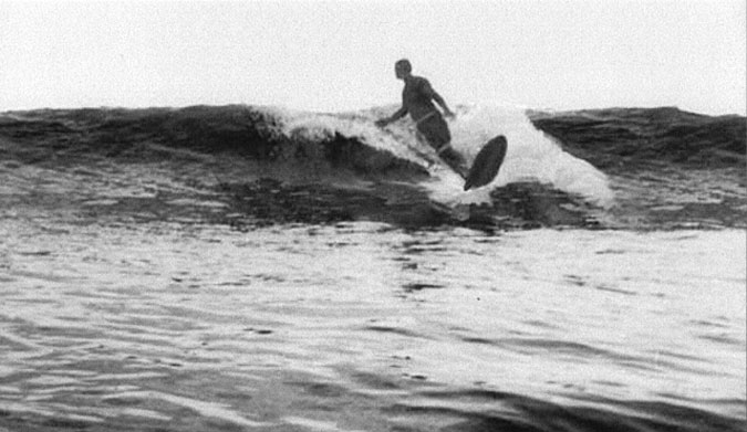 Johnny surfing at Marine Street, Manhattan Beach, circa 1955.